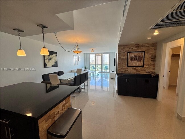 Building Photo - 19370 Collins Ave