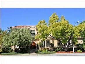 Building Photo - "Elegant 5-Bedroom Oasis with 4 Luxurious ...