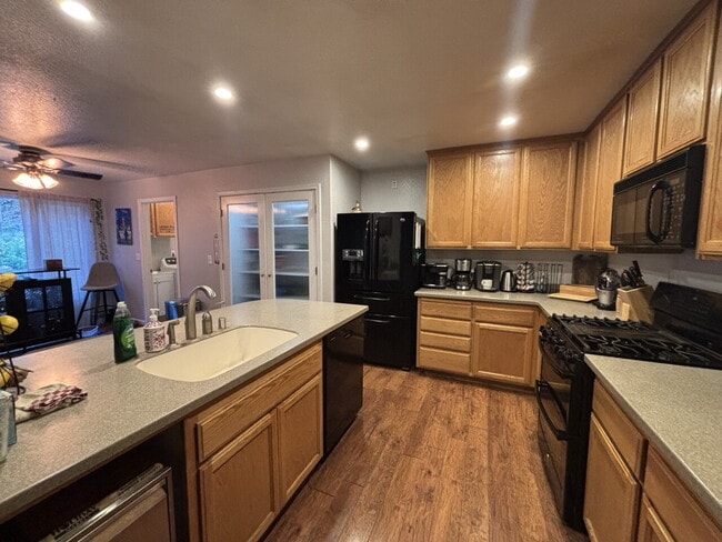 Building Photo - Rare 4-bedroom 3-bath home with studio apartment conveniently located off Starkes Grade Road! Opt...