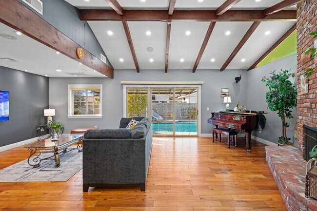 Building Photo - Luxury Estate with Sparkling Pool & Elegant Amenities