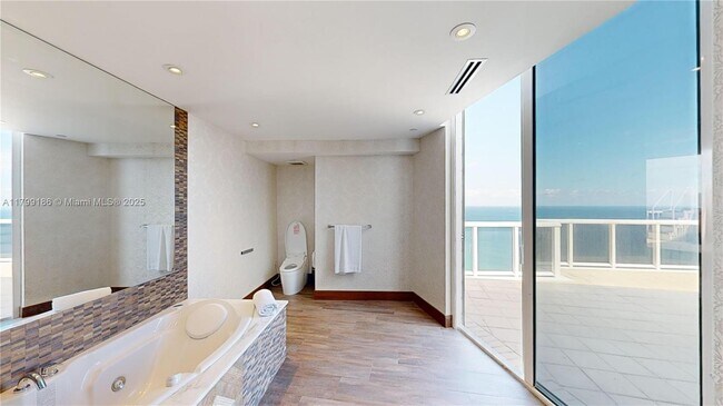 Building Photo - 18201 Collins Ave