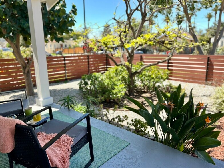 The front porch is the perfect spot to sit and rock. - 2824 S Orange Dr