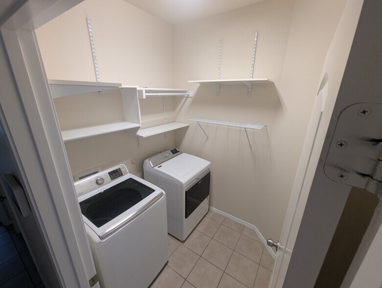Separate laundry room with washer and dryer - 2853 Waterfall Ln