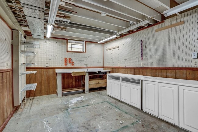 Building Photo - Spacious 4-Level Home with Deck, Workshop ...