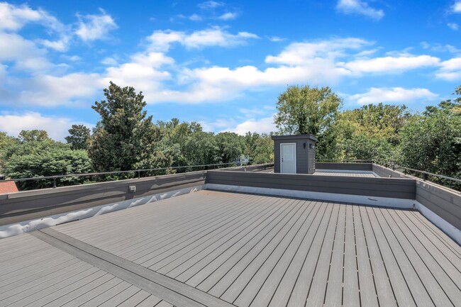 Building Photo - Modern New Construction Townhome with Roof...