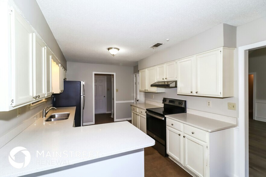 Building Photo - 4462 Garrison Ave