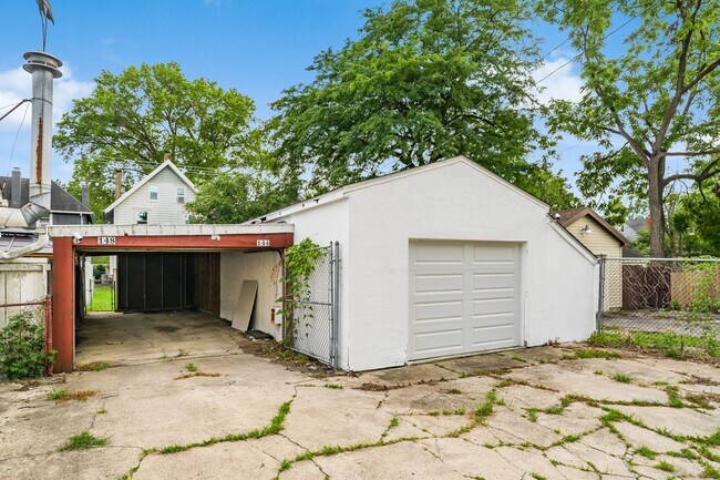 Car Port, Garage & off street parking - 144 E Tompkins St