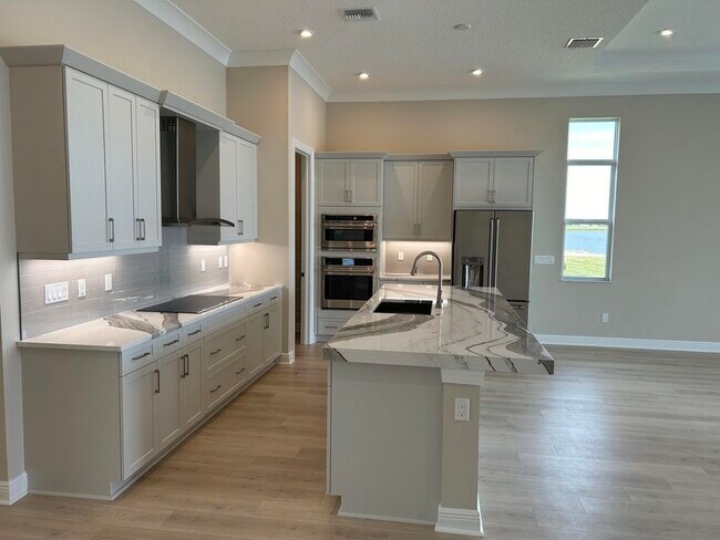 Building Photo - 11243 SW Pietra Wy