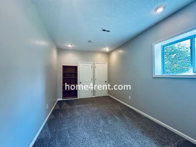 Building Photo - Brand New Paint, Wood Floors, Walkout Fini...