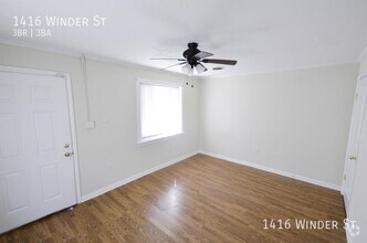 Building Photo - RENOVATED 3 Bed, 3 Bath with 2 Car Enclose...