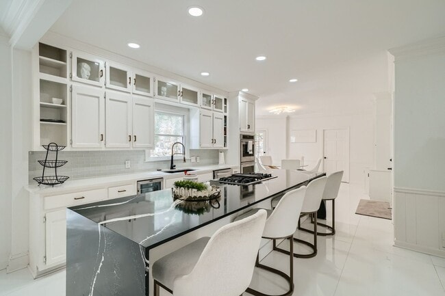 Building Photo - Furnished Estate Home - Double Curved Stairway - Marble Floors - Waterfall Island