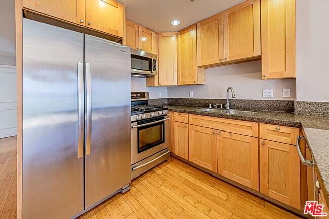 Building Photo - 3061 W 12th Pl