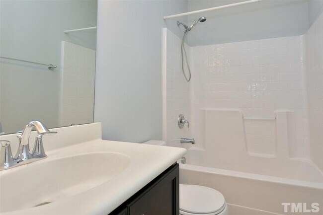 Building Photo - 3 Bedroom 2.5 Bathroom Townhome Home w/ Open Floorplan and a 2 car Garage in the heart of Morrisv...