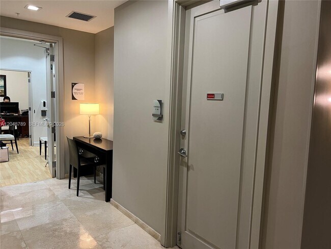 Building Photo - 10275 Collins Ave