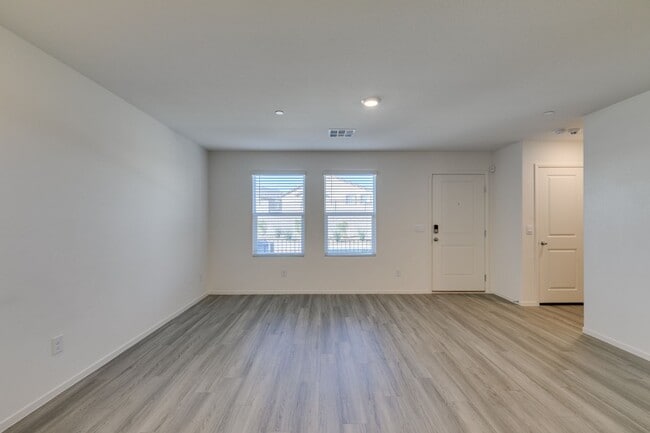 Building Photo - Gorgeous Townhome with upgrades in gated community* 3 large bedrooms, 2 car garage*Community pool...