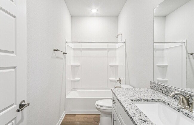 Building Photo - "Charming 3-Bedroom Duplex in San Antonio with Granite Elegance!"