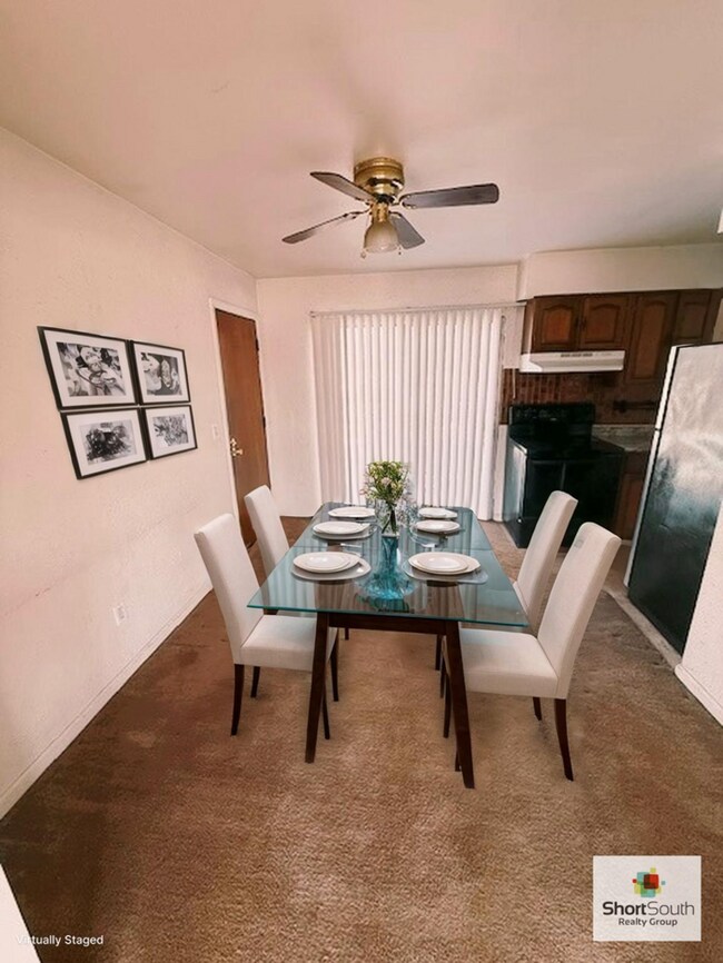 Building Photo - Updated - 2 bed 1.5 bath, Duplex with attached garage and fenced in backyard