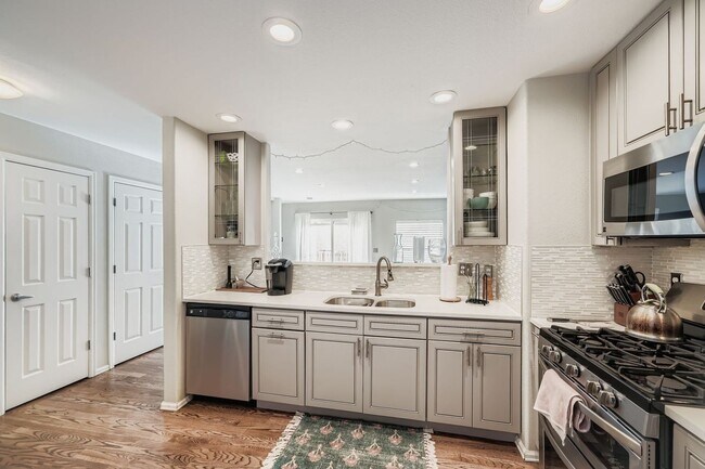 Building Photo - LOCATION, LOCATION! Featuring modern finishes and a peaceful outdoor retreat, this 2-bed 2.5-bath...