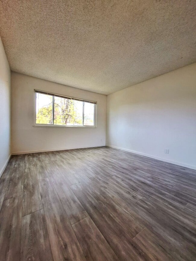 Building Photo - Spacious Two-Story 3bd Townhouse With Private Patios, Balcony, & Garage