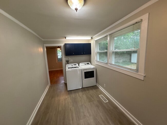 Building Photo - Classic charm meets modern comfort in this updated Madison cottage with a large backyard and conv...