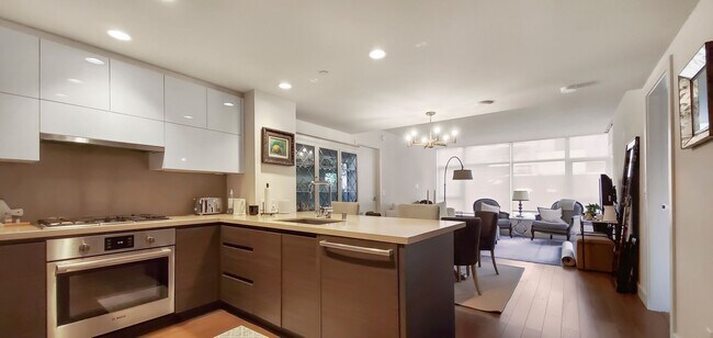 Building Photo - One of kind 7th terrace unit in reputable ...