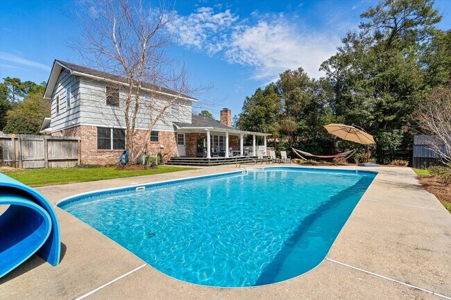 Building Photo - Spacious 4-Bedroom Home with Pool, Two Pri...