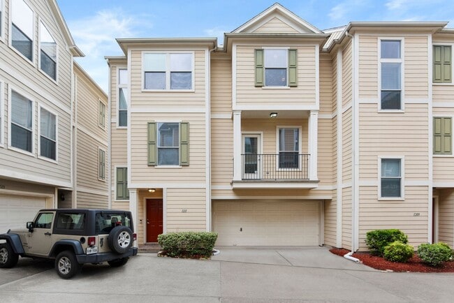 Primary Photo - Come see this modern 3-story townhome in t...