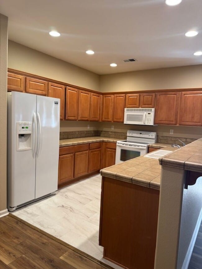 Building Photo - Located in a Quiet, Gated Community in Car...