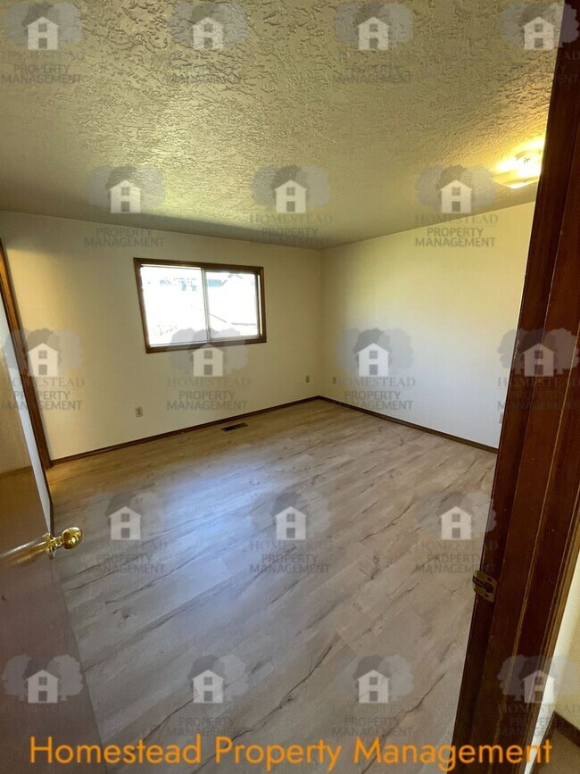 Building Photo - Celebrate the new year with 1/2 off one months rent!