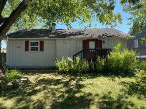 Building Photo - Spacious 4-Bedroom Home with Garage and Backyard in Milan!