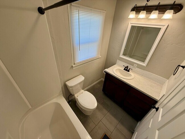 Building Photo - Charming 2-Bedroom Home with Patio, Storage & Plenty of Parking