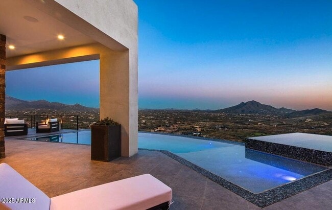 Building Photo - 4880 E Lone Mountain Rd N