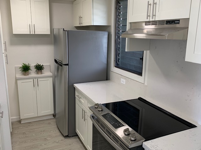 New cabinets, refrigerator & range - 2100 Date St