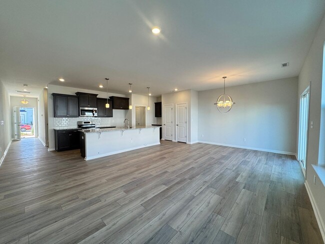 Building Photo - Brand New Open floor plan, 2 car garage to...