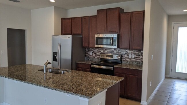 Building Photo - Stunning 2 Story 4-Bedroom Home In Serenoa Community – Clermont, FL