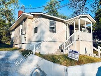 Building Photo - Charming 2-Bedroom Duplex Unit for Rent