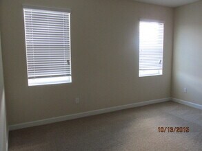 Building Photo - VALENCIA FLOOR PLAN, 4 BEDROOMS 3.5 BATHS ...