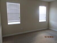 Building Photo - VALENCIA FLOOR PLAN, 4 BEDROOMS 3.5 BATHS ...