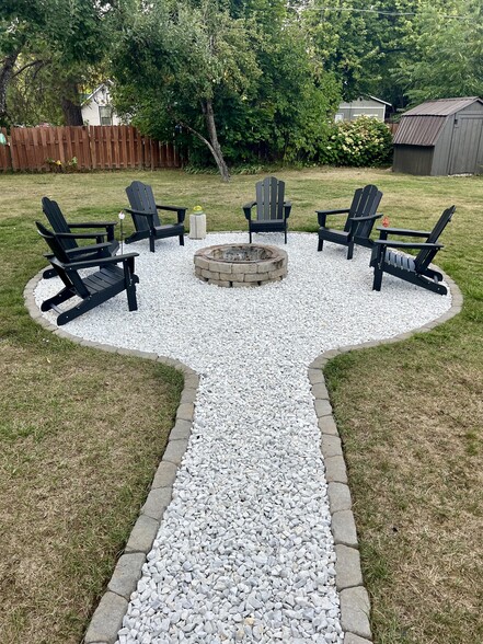 Inviting fire pit for cozy outdoor activities - 920 Oak St