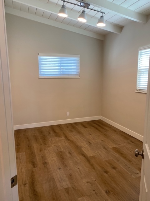 Bedroom with washer/dryer: view facing back alley - 210 30th St