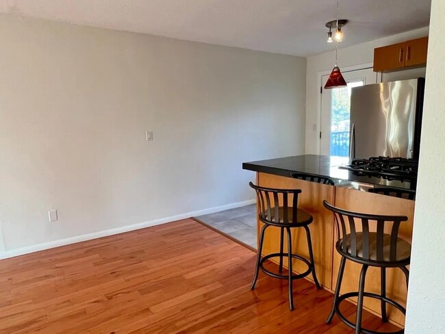 kitchen and backdoor to private patio - 4956 NE 9th Ave