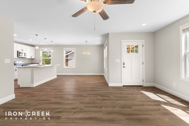 Building Photo - Bright and Modern: New Construction Three-...