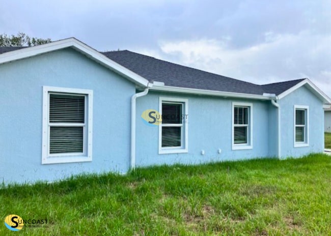 Building Photo - BEAUTIFUL DUPLEX  WITH GARAGE IN FT. MYERS