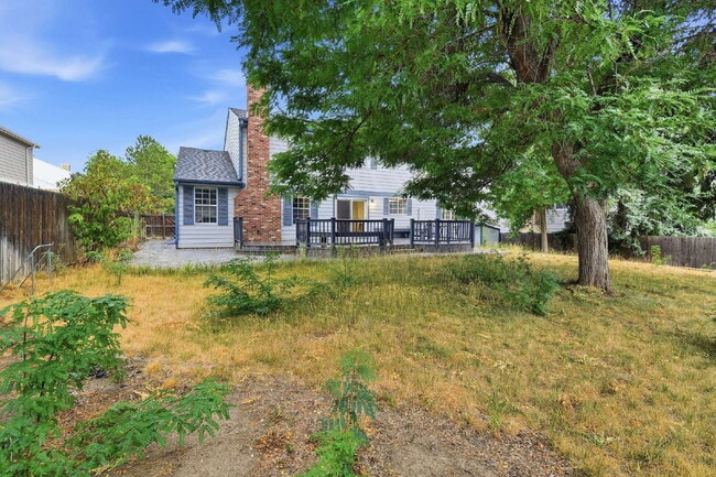 Building Photo - $2,645.95, 4-bed, 2.5-bath located in Centennial with a fenced backyard.