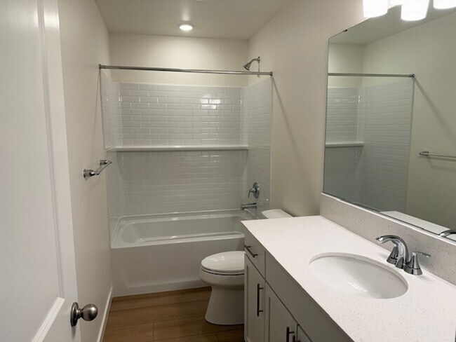 Building Photo - Elegant 4-Bed, 4-Bath 3-Story Home with Gourmet Kitchen & Private Backyard