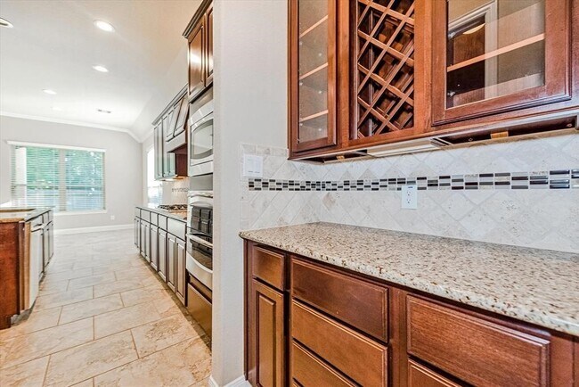 Building Photo - 6838 Adrienne Arbor Dr