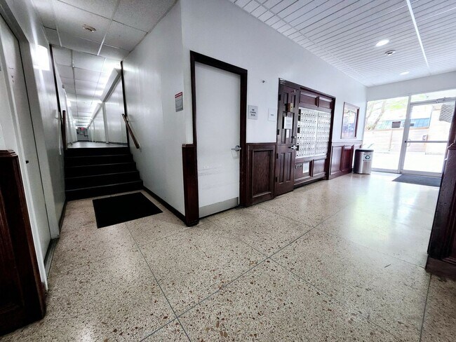 Building Photo - Modern Downtown Living with Comfort, Security & Style