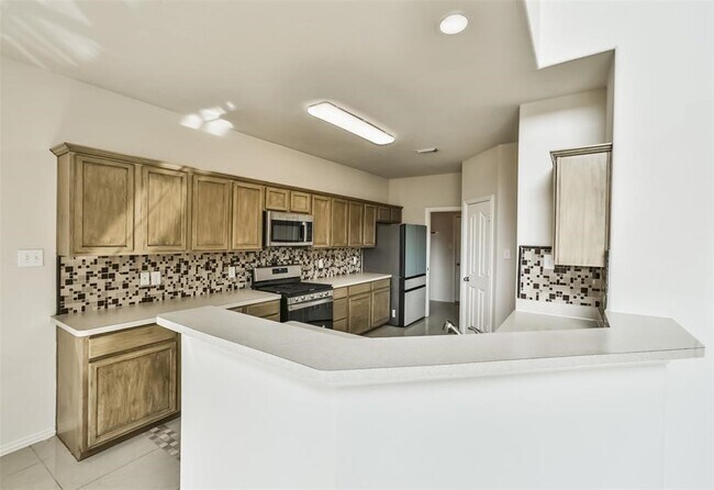 Building Photo - 911 Merlin Roost Ct