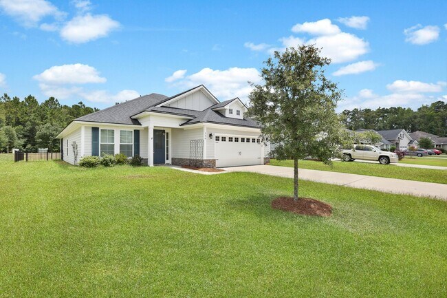 Building Photo - Spacious 4BR/3BA Pooler Home – Lagoon Views, Prime Location
