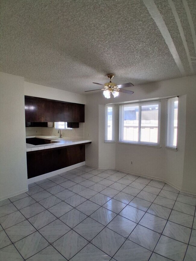 Building Photo - SPECIAL: HALF OF FIRST MONTH RENT!! Spacious 3 Bedroom With Garage Located On Ashlan & Cornelia!